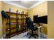 Home office with built in shelving and ample light at 260 Shadowbrooke Dr, Loganville, GA 30052