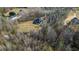An aerial view of the home showing the tree coverage around the property at 351 Allendale Dr, Canton, GA 30115