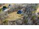 An elevated view of the residence surrounded by trees within a serene neighborhood at 351 Allendale Dr, Canton, GA 30115
