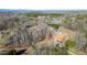 Expansive aerial view of the neighborhood highlighting the home's private, wooded setting at 351 Allendale Dr, Canton, GA 30115