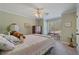 Comfortable bedroom with a ceiling fan, neutral colors, and a window at 351 Allendale Dr, Canton, GA 30115