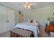 Charming bedroom with a ceiling fan, a chest, and double closets at 351 Allendale Dr, Canton, GA 30115