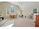Large bonus room with multiple windows, carpet, and ample space for activities at 351 Allendale Dr, Canton, GA 30115