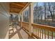 Charming covered patio with wood ceiling, offering a cozy space for outdoor relaxation and entertaining at 351 Allendale Dr, Canton, GA 30115