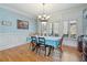 Elegant dining room boasting wainscoting, natural light, and stylish decor at 351 Allendale Dr, Canton, GA 30115
