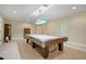 Spacious game room with a pool table, storage, and neutral colors offers a relaxing atmosphere at 351 Allendale Dr, Canton, GA 30115
