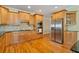 Modern kitchen featuring stainless steel appliances, granite counters, and custom cabinets at 351 Allendale Dr, Canton, GA 30115