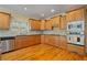 Well-appointed kitchen with custom cabinetry, stainless appliances, and granite countertops at 351 Allendale Dr, Canton, GA 30115