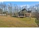 Expansive lawn and deck highlight this gorgeous home, offering fantastic outdoor living space at 351 Allendale Dr, Canton, GA 30115