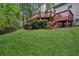 Large backyard with multiple decks and staircase at 4125 Gables Pl, Buford, GA 30519