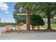 Entrance to Huntington West features brick sign and landscaped median but has some road construction at 4125 Gables Pl, Buford, GA 30519