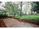 Picture of the private backyard, showcasing greenery and ample space for outdoor activities at 4144 Hideaway Dr, Tucker, GA 30084