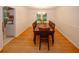 Formal dining room with hardwood floors and a large table, perfect for entertaining guests at 4144 Hideaway Dr, Tucker, GA 30084