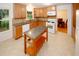Well-lit kitchen with stainless steel appliances, granite counters, and a convenient island at 4144 Hideaway Dr, Tucker, GA 30084