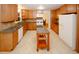 Spacious kitchen with granite countertops, modern appliances, and ample cabinet space at 4144 Hideaway Dr, Tucker, GA 30084