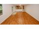 Living room features wood floors, natural light, and access to the kitchen at 4144 Hideaway Dr, Tucker, GA 30084