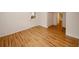 Living room with wood floors and view into another room at 4144 Hideaway Dr, Tucker, GA 30084