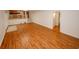 Bright living room featuring hardwood floors and access to other rooms at 4144 Hideaway Dr, Tucker, GA 30084