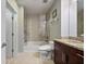Neutral bathroom featuring a granite countertop vanity and tiled shower and tub at 855 Peachtree Ne St # 2801, Atlanta, GA 30308