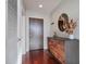 Modern hallway with a decorative mirror, console table, and stylish accents at 855 Peachtree Ne St # 2801, Atlanta, GA 30308