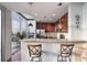 Updated kitchen with granite counters, stainless appliances, and an island with barstool seating at 855 Peachtree Ne St # 2801, Atlanta, GA 30308
