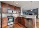 Modern kitchen with stainless steel appliances and granite countertops at 855 Peachtree Ne St # 2801, Atlanta, GA 30308