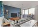 Chic living room with modern decor, hardwood floors, and panoramic city views at 855 Peachtree Ne St # 2801, Atlanta, GA 30308