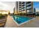 Stunning rooftop pool with comfortable lounge chairs and panoramic city views at 855 Peachtree Ne St # 2801, Atlanta, GA 30308
