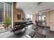 Bright weight room featuring free weights and a full mirror for fitness enthusiasts at 855 Peachtree Ne St # 2801, Atlanta, GA 30308