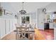 Inviting dining room with stylish table setting and natural light from the sliding glass doors at 113 Emerald Pines Dr, Dallas, GA 30157