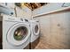 Functional laundry area featuring a Samsung washer and dryer, ready for your laundry needs at 113 Emerald Pines Dr, Dallas, GA 30157