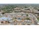 Aerial view of a townhome community with lush landscaping at 2427 Millbank Ct, Lawrenceville, GA 30043