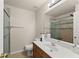 Bathroom featuring a walk-in shower, vanity with cabinet and a neutral color scheme at 2427 Millbank Ct, Lawrenceville, GA 30043