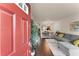 Inviting entryway flowing into a well-lit living space with hardwood floors and stylish decor at 2427 Millbank Ct, Lawrenceville, GA 30043