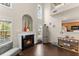 Inviting living room features a fireplace, hardwood floors, and natural light at 2427 Millbank Ct, Lawrenceville, GA 30043