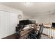 Upstairs office area with a modern desk setup and plenty of natural light at 2427 Millbank Ct, Lawrenceville, GA 30043