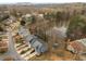 Community aerial view with scenic lake and townhome community at 917 Edgewater Cir, Marietta, GA 30062