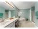 Primary bathroom features dual vanity, separate shower, large soaking tub, and luxurious amenities at 917 Edgewater Cir, Marietta, GA 30062