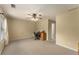Spacious bedroom with carpeting, ceiling fan, neutral walls, and versatile space for work or relaxation at 917 Edgewater Cir, Marietta, GA 30062
