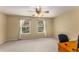 Versatile bedroom with two windows, carpet, and a ceiling fan, can be adapted to any style at 917 Edgewater Cir, Marietta, GA 30062