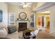 Bright living room with a fireplace, neutral decor, and sliding doors to the outdoor deck at 917 Edgewater Cir, Marietta, GA 30062