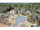Aerial view of homes in a cul-de-sac surrounded by mature trees in a lovely neighborhood at 1303 Angel Falls Sw Ln, Atlanta, GA 30311