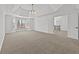 Spacious main bedroom with large windows and tray ceiling at 1303 Angel Falls Sw Ln, Atlanta, GA 30311