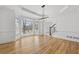 Dining room boasting hardwood floors, crown molding, and a bay window with natural light at 1303 Angel Falls Sw Ln, Atlanta, GA 30311