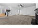 An open floorplan living room featuring a staircase and fireplace at 1303 Angel Falls Sw Ln, Atlanta, GA 30311