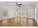 Bright and airy living room featuring hardwood floors, and lots of windows at 1303 Angel Falls Sw Ln, Atlanta, GA 30311