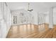 A bright and airy sunroom with hardwood floors and lots of windows at 1303 Angel Falls Sw Ln, Atlanta, GA 30311