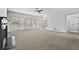 A large living room featuring a fireplace and lots of natural light at 1303 Angel Falls Sw Ln, Atlanta, GA 30311