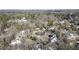 An aerial view showing a high-end real estate market with mature trees and well-kept properties at 1386 Wesley Nw Cir, Atlanta, GA 30327