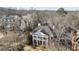 Aerial view of the property showcasing its grand facade and mature landscaping within the neighborhood at 1386 Wesley Nw Cir, Atlanta, GA 30327